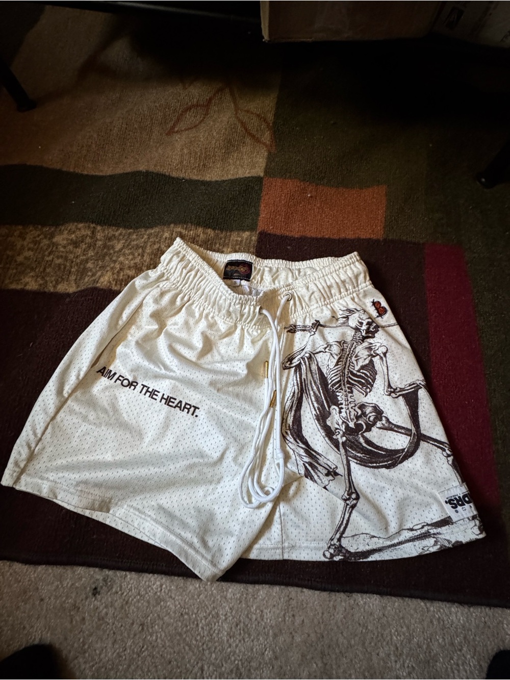 White Graphic Skeleton Men’s Athletic Shorts - Aim For The Heart